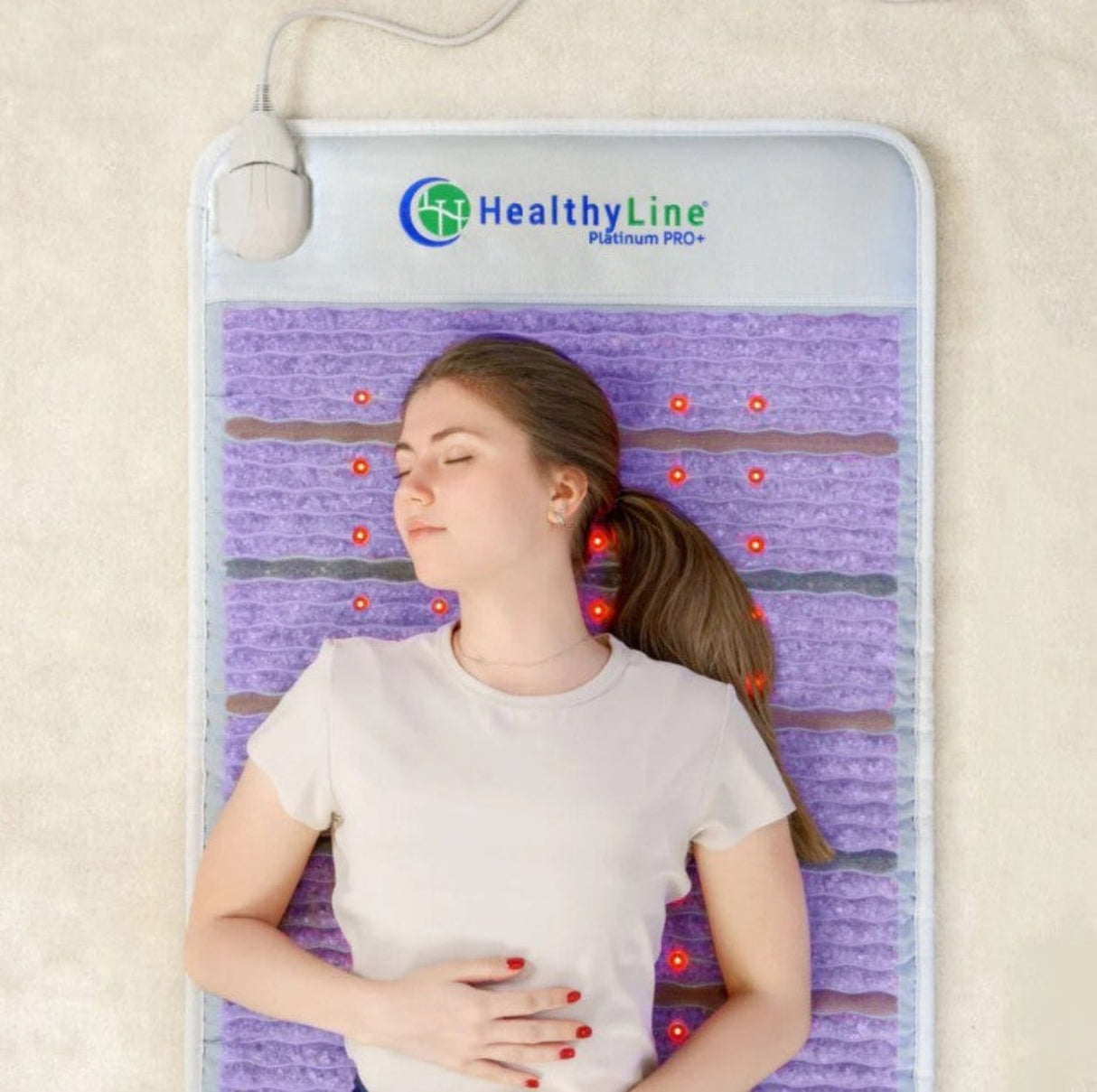 Image of the HealthyLine Platinum Mat™ in use, demonstrating its application for muscle relaxation