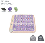 Close-up of the gemstones on the Healthy Line TAJ-Mat™ 2020, including tourmaline, amethyst, and jade, emphasizing their therapeutic properties