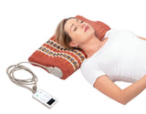 HealthyLine TAO-Mat® Pillow Soft providing heated support to neck and shoulders.