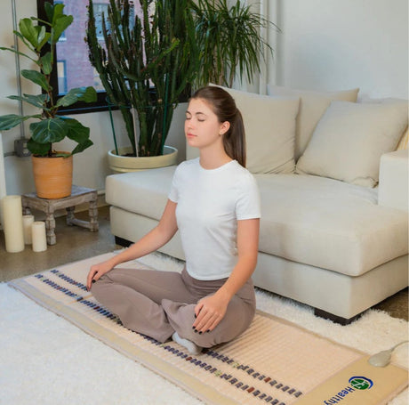 The mat positioned in a cozy home environment, reinforcing its use for personal wellness.