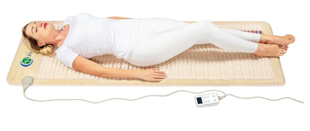 A model comfortably lying on the SOFT-Mat™, demonstrating its use for relaxation and therapy.