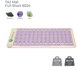 The front view reveals the arrangement of tourmaline, amethyst, and jade along the mat’s surface.