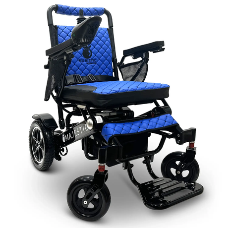 User operating the ComfyGO MAJESTIC IQ-7000 Electric Wheelchair with a remote control.